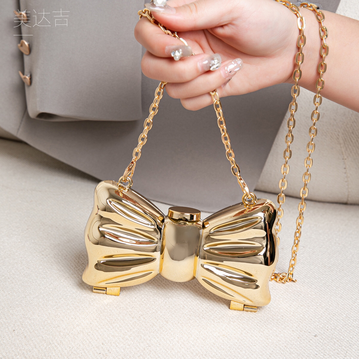 Glossy Gold Metal Bow Shaped M - Wallet Chain Bag review and price